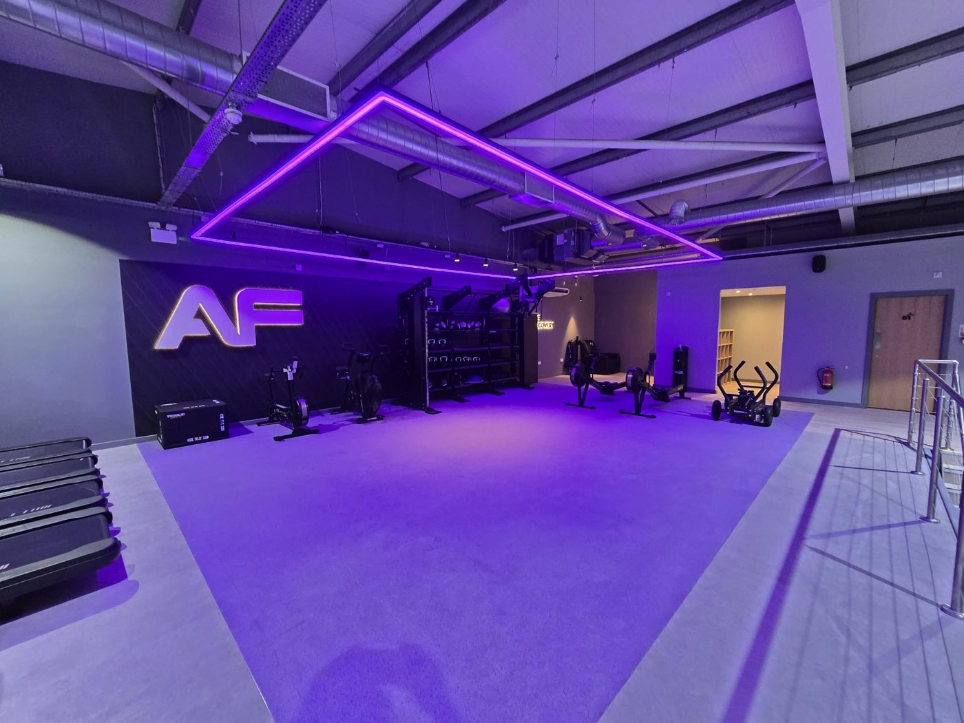 Anytime Fitness Leeds — refurbished mezzanine with AF feature wall