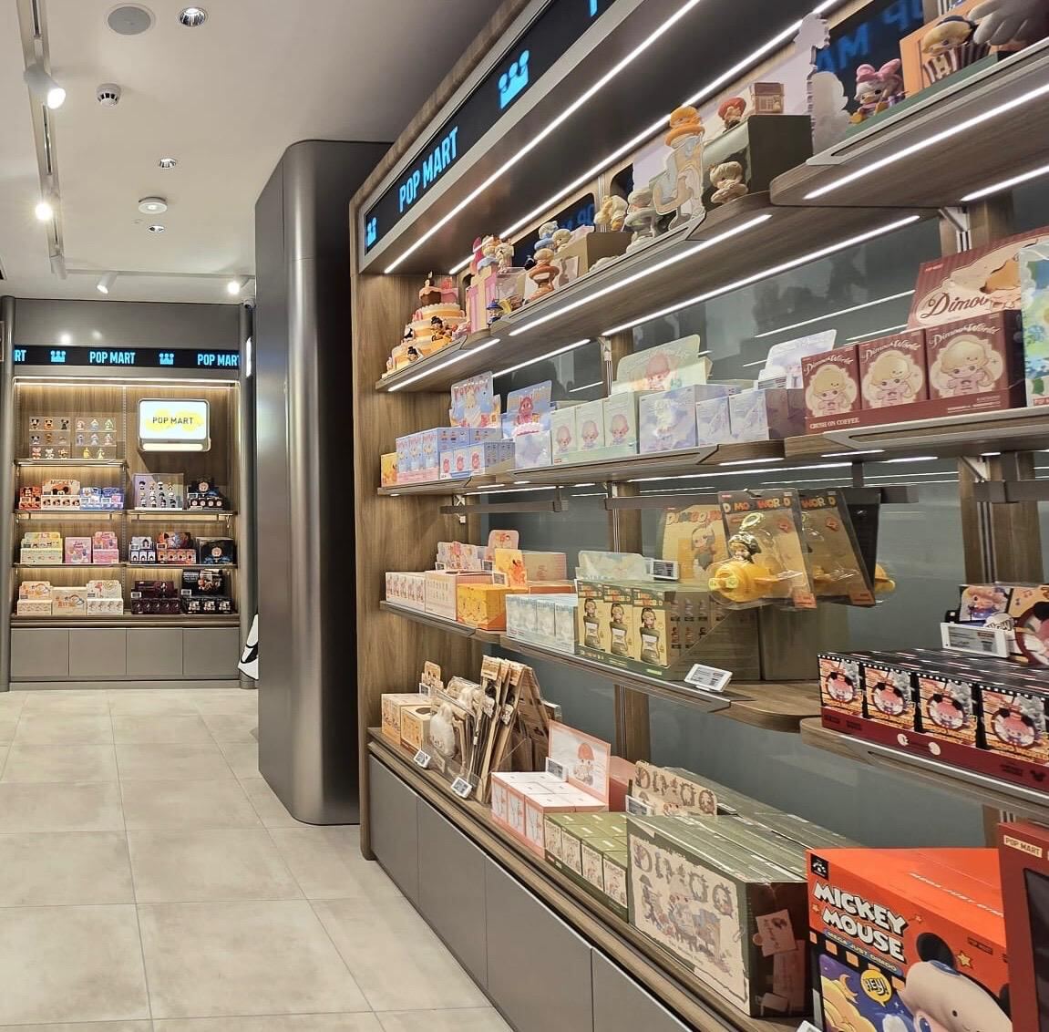 Pop Mart Leeds — finished store with steel-clad feature column and shelving