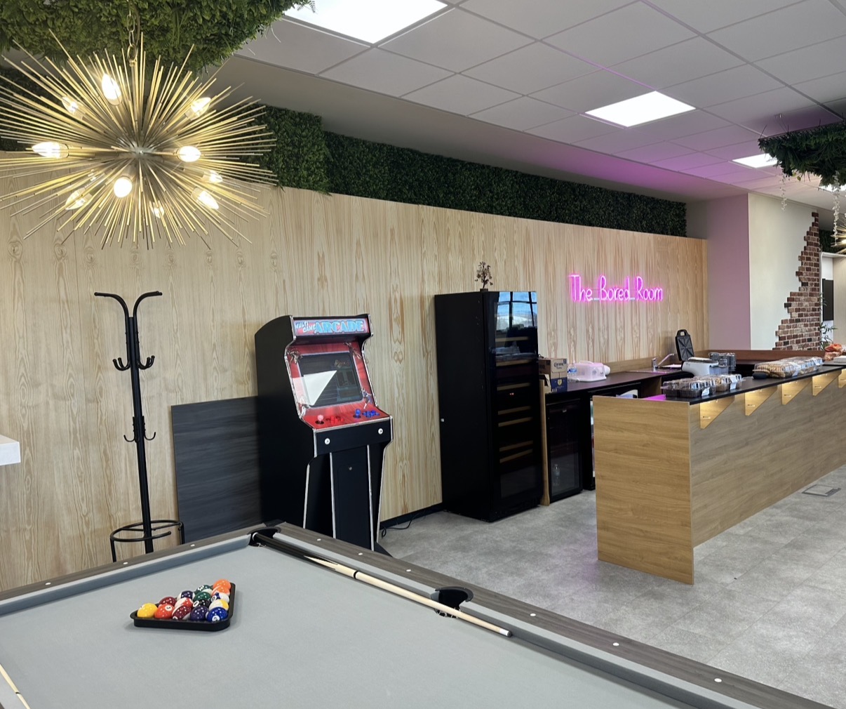 Truly SMB — The Bored Room arcade and bar area